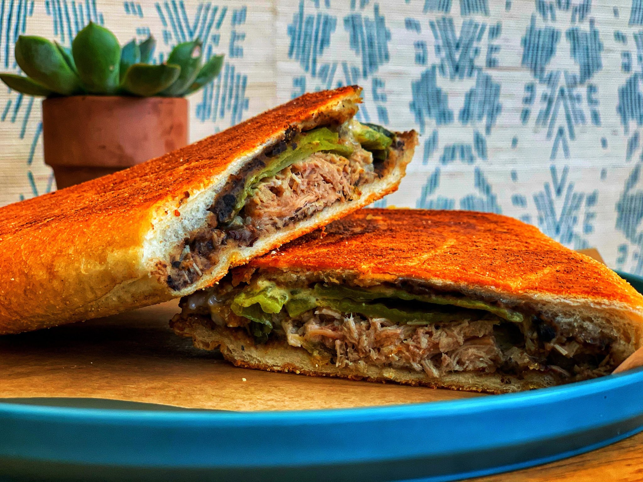 Colada Shop is celebrating National Cuban Sandwich Day with a Thamee Cubano collaboration. Photo courtesy of Colada Shop.