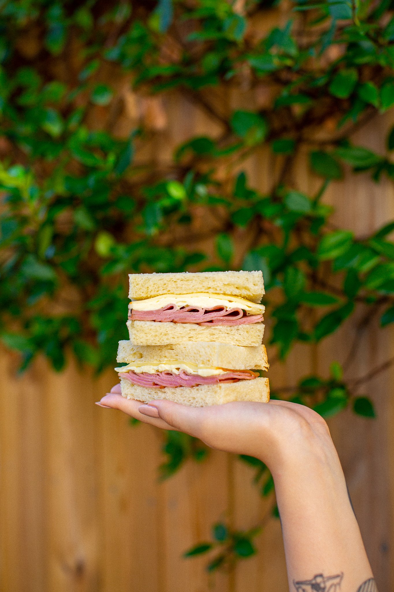 A ham, cheese, and butter sando on milk bread. Photo courtesy of Hello Sando. 
