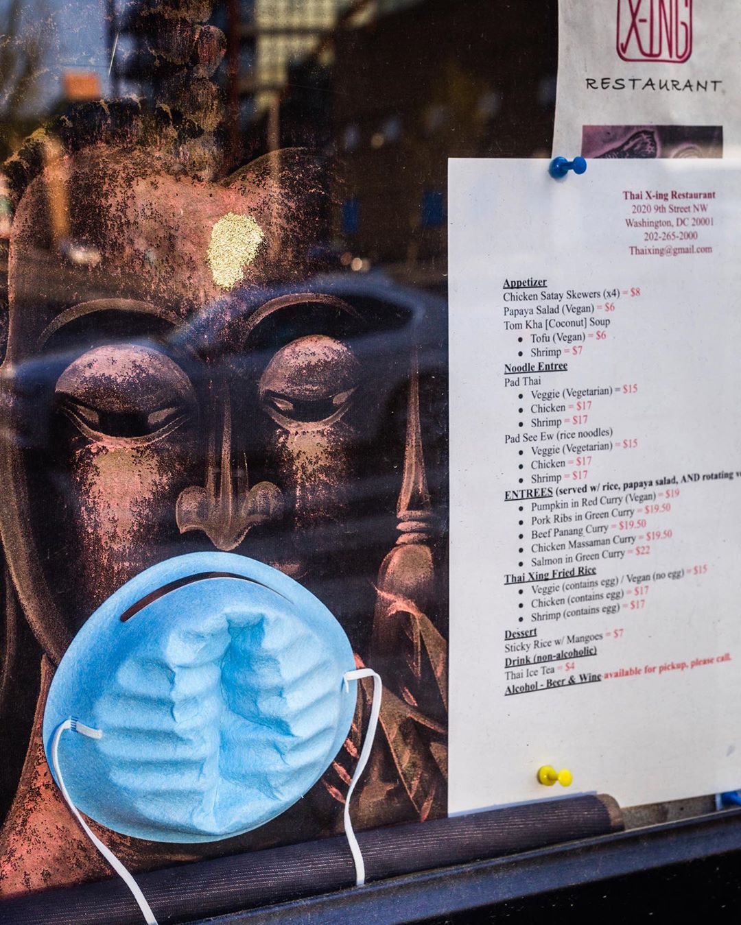 A sign wears a mask at Thai X-ing near Howard University Hospital. Photo courtesy of DC 