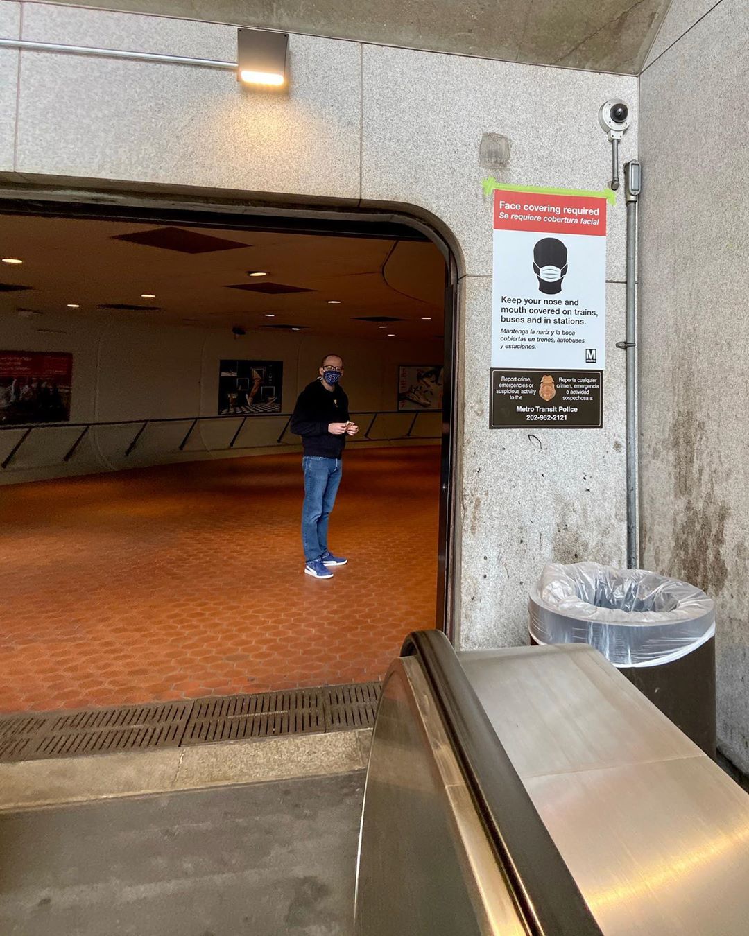 A "face covering required" sign at the Eastern Market Metro. Photo courtesy of DC Public Library.