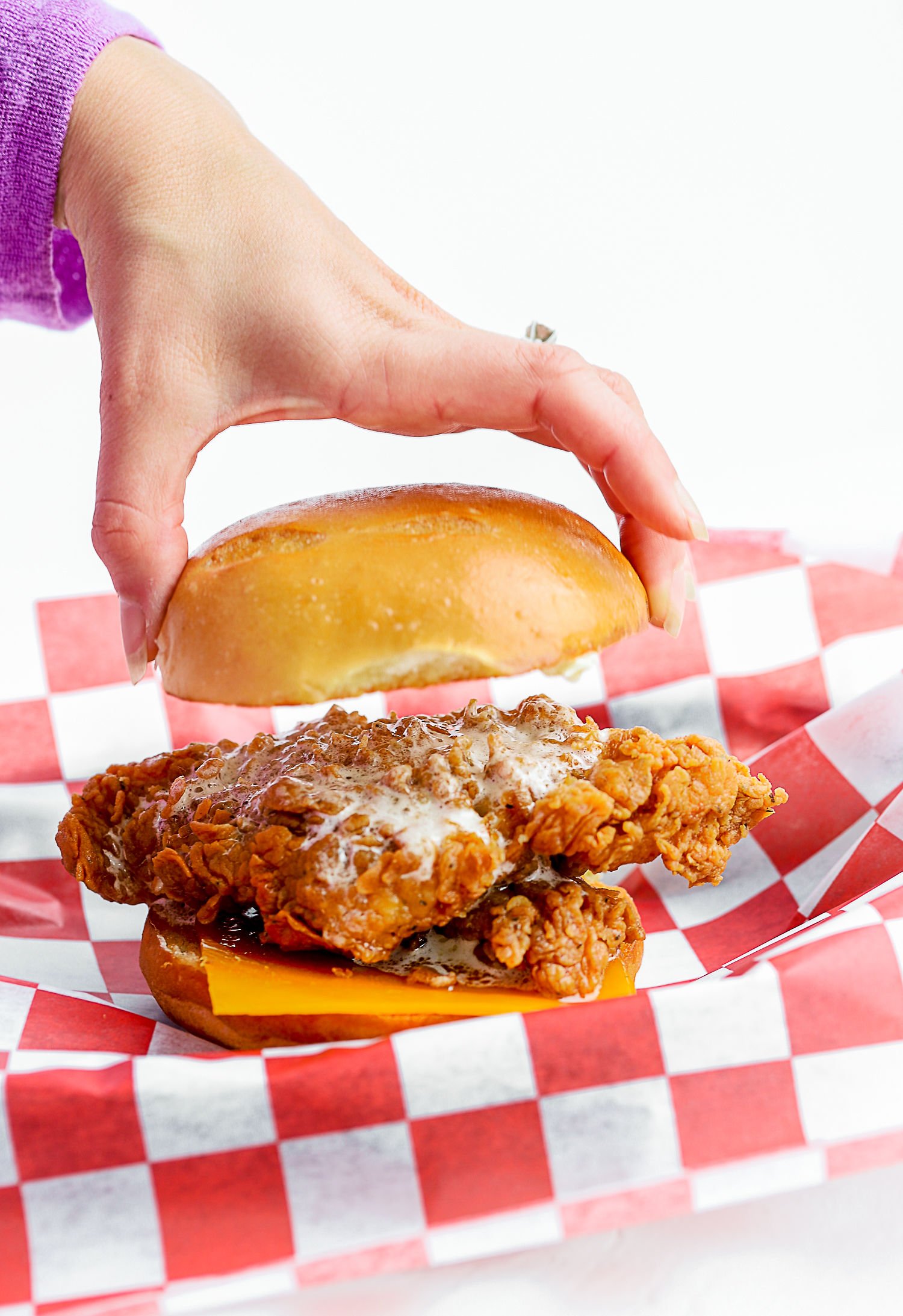 A fried chicken sandwich with honey butter. Photo courtesy of Roaming Rooster. 