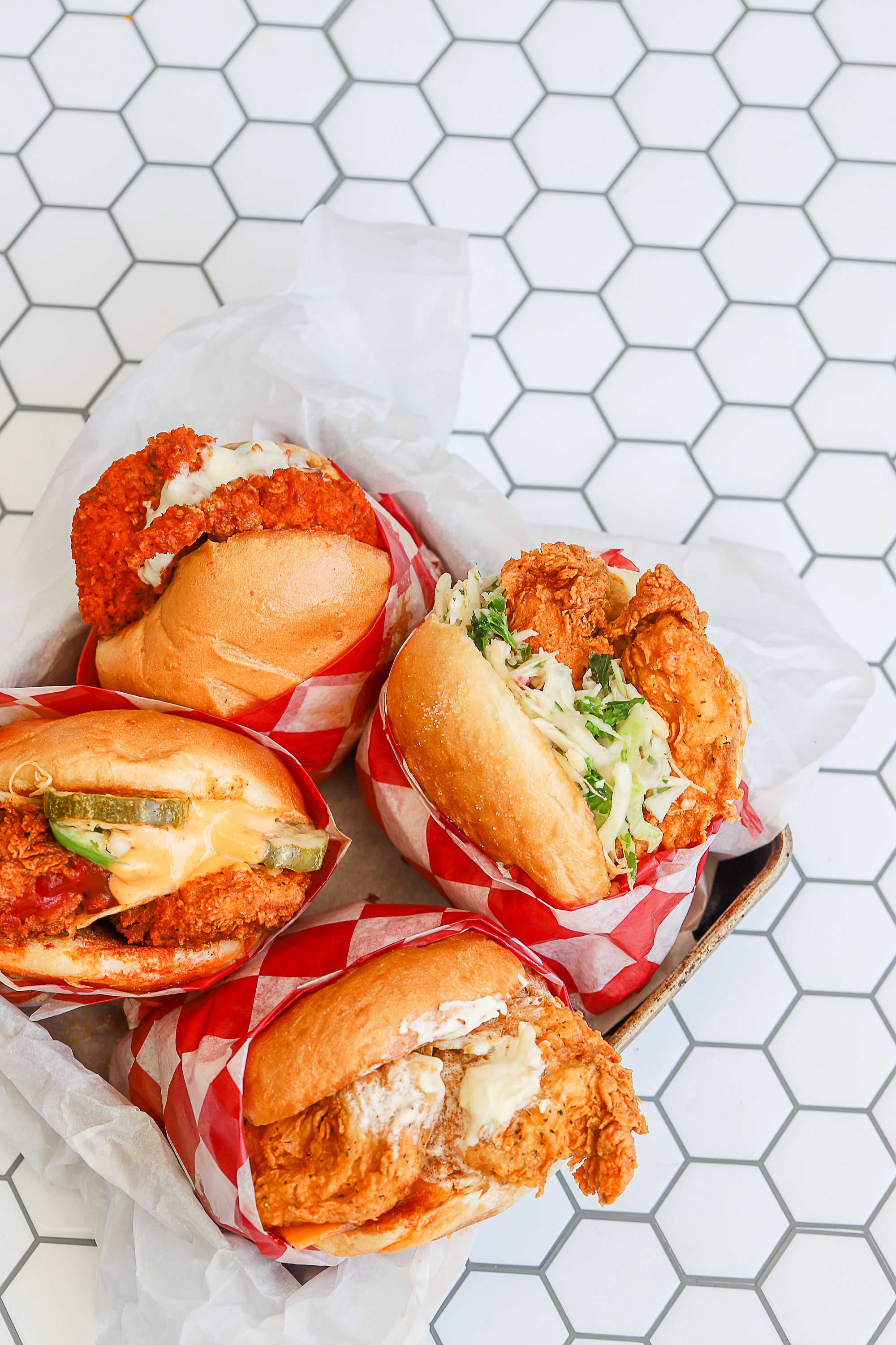 The restaurant offers a variety of chicken sandwiches, including a Nashville hot chicken option. Photo by Roaming Rooster.