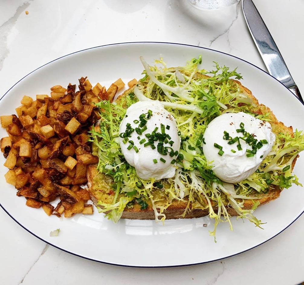 D0D3CDCC-E12D-446C-BF83-1CDDBA5CFA08 - Washingtonian Avocado toast with frisee at Georgetown's Brasserie Liberté. Photo courtesy of Brasserie Liberté.