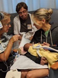 An impromptu baptism of the little girl before she died. Photograph courtesy of Carrie Brady.