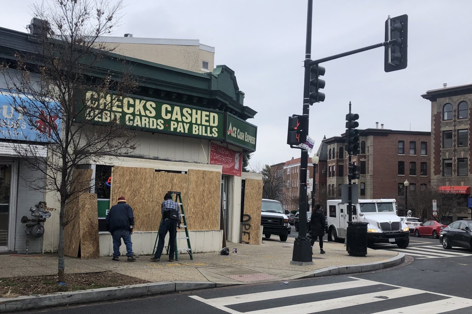 A boarded-up shop in Adams Morgan. Photo by Anna Spiegel.