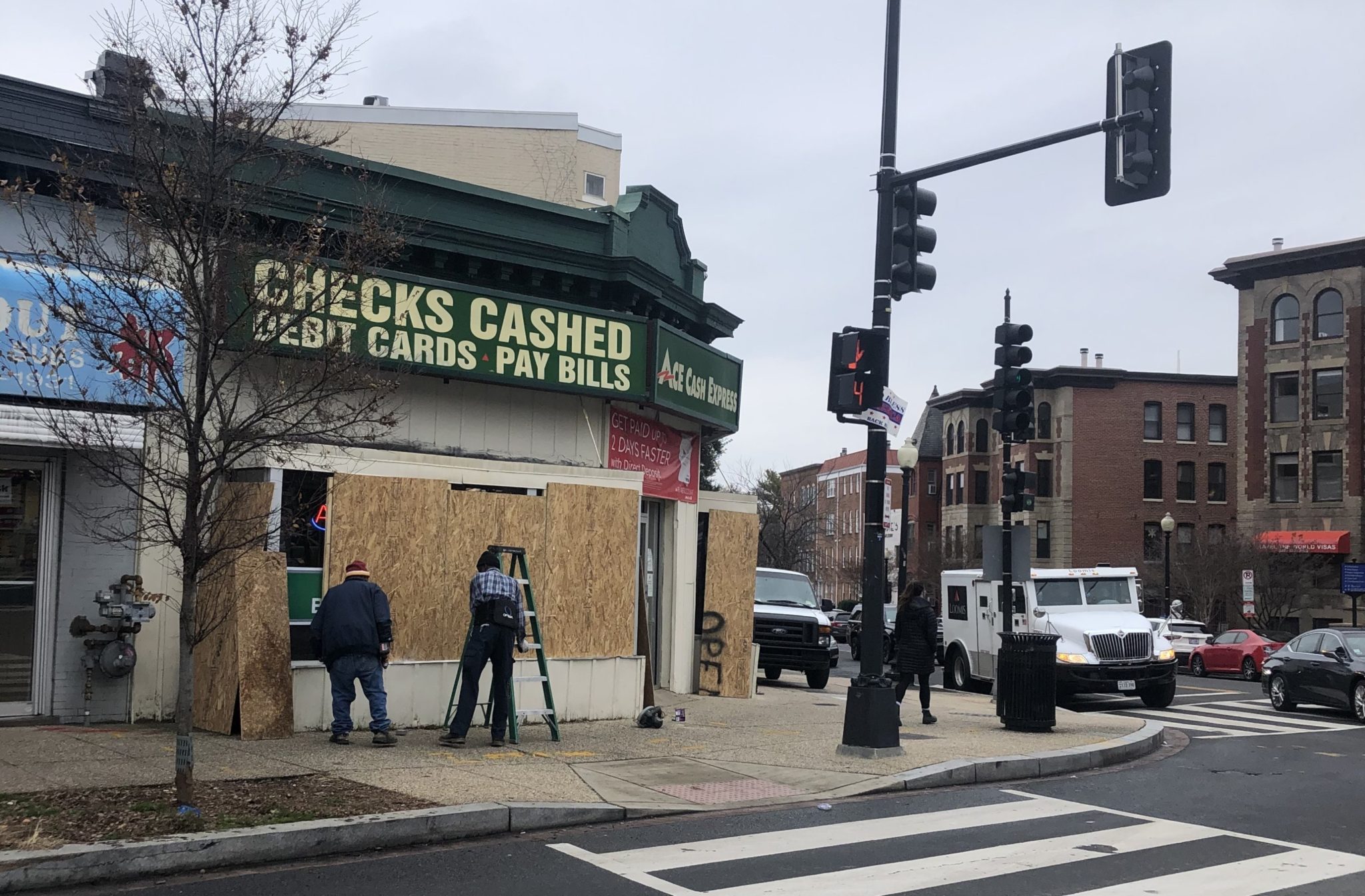 A boarded-up shop in Adams Morgan. Photo by Anna Spiegel.