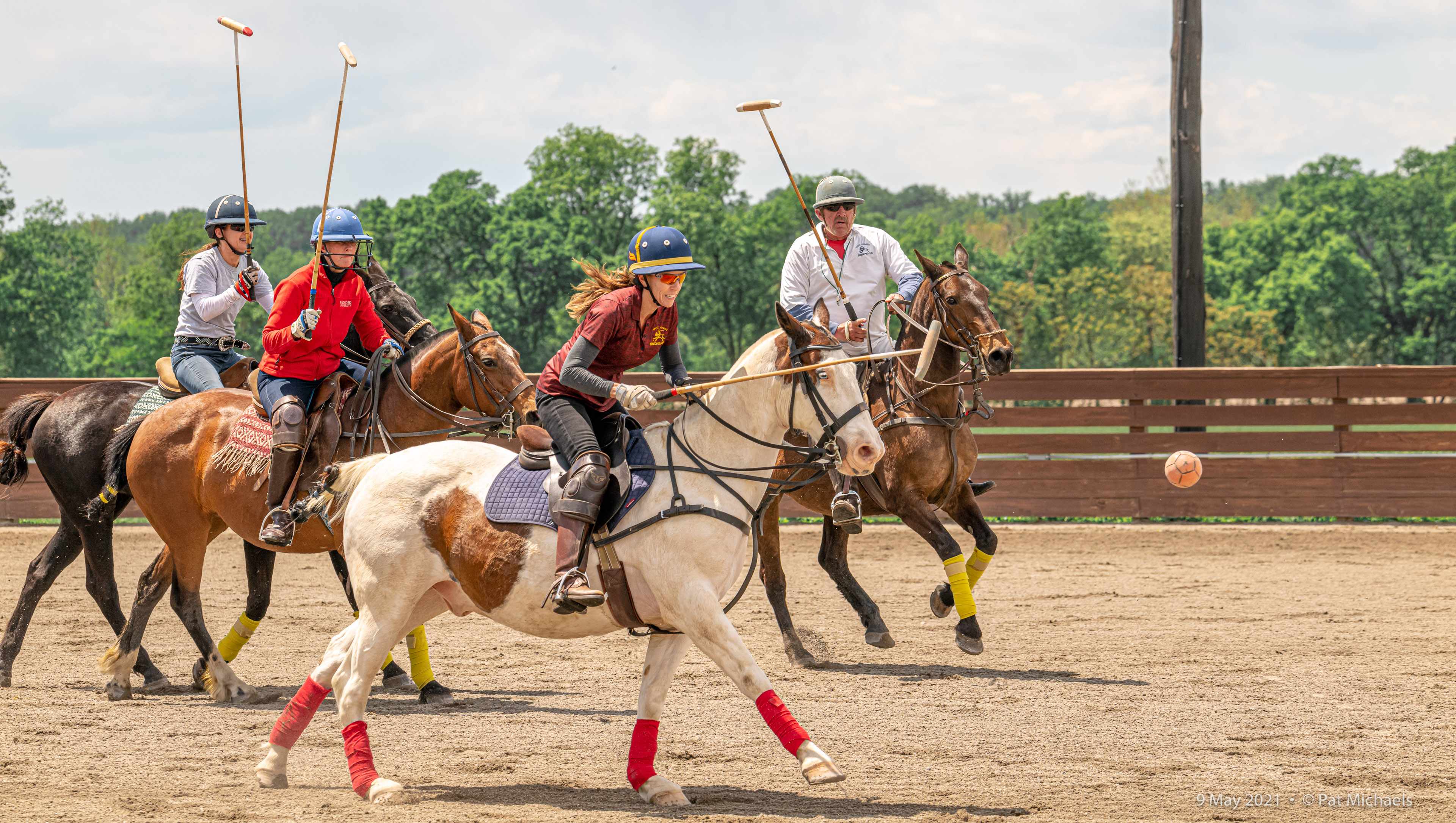 Tracy with ball in air 210508-A1050569-Pat_Michaels-SenecaPolo - Washingtonian