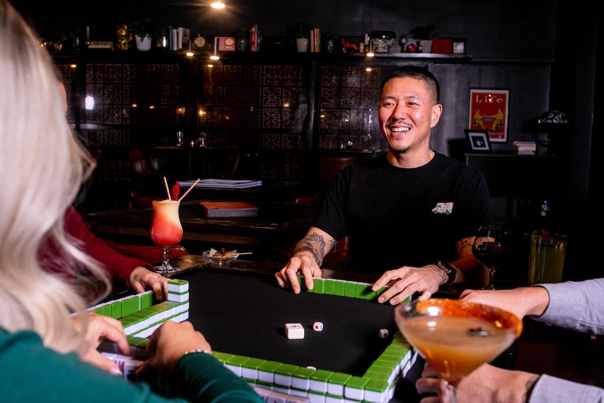 Scott Chung playing Mahjong - Washingtonian