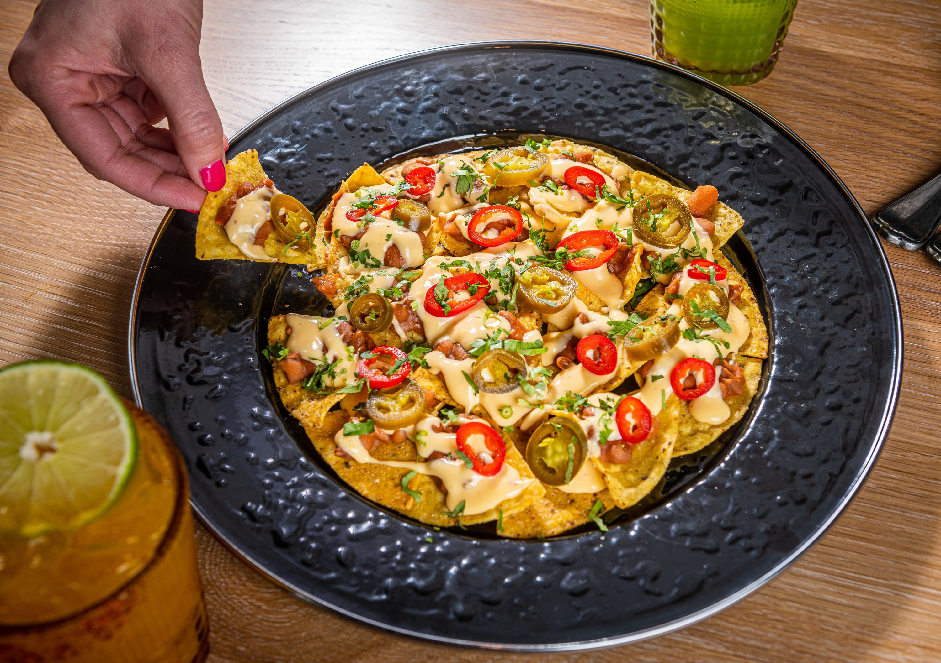 untitled-4799 - Washingtonian Nachos with queso. Photo by Rey Lopez.