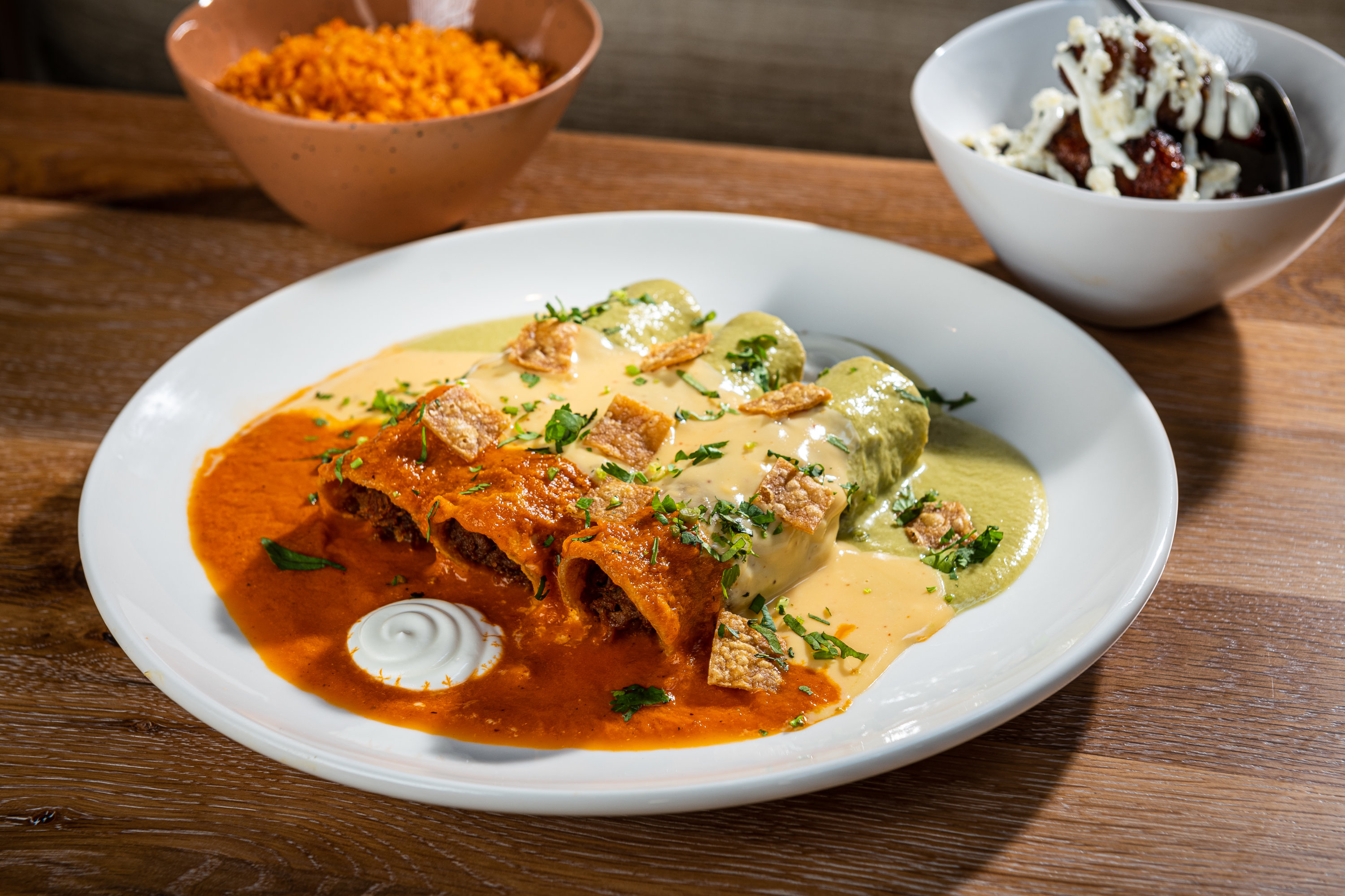 Tri-color enchiladas. Photo by Rey Lopez.