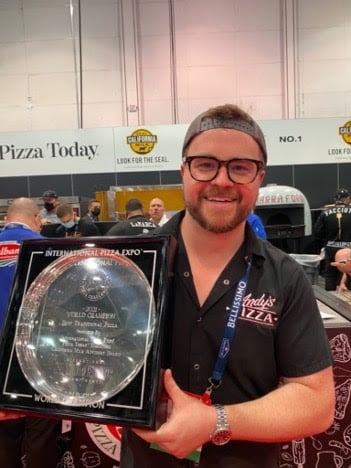 Andy Brown with his International Pizza Challenge trophy. Photo courtesy of Andy's Pizza.