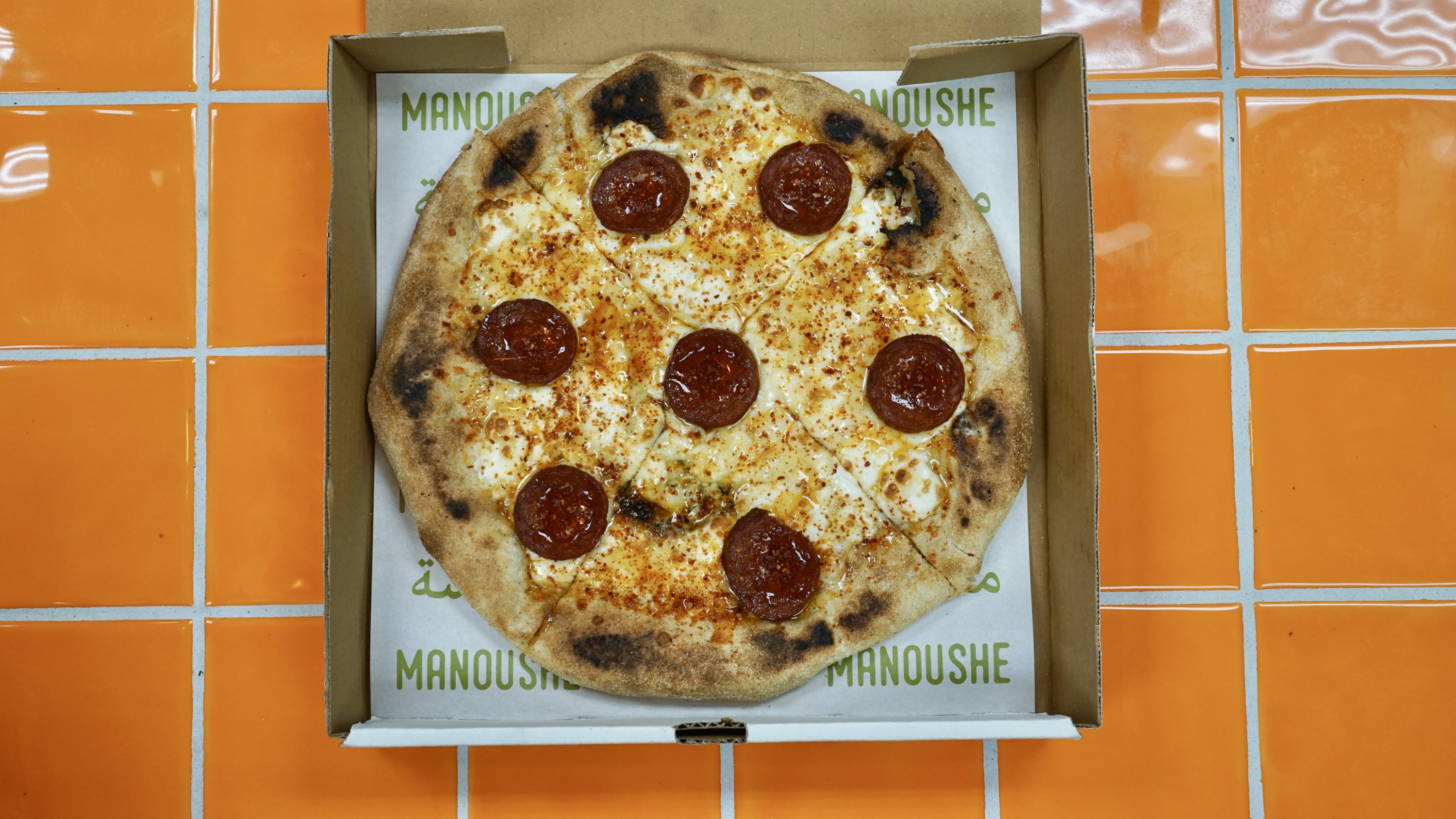 Don't call it a pizza: This manoushe is topped with sausage and hot honey. Photo courtesy of Z&Z. 