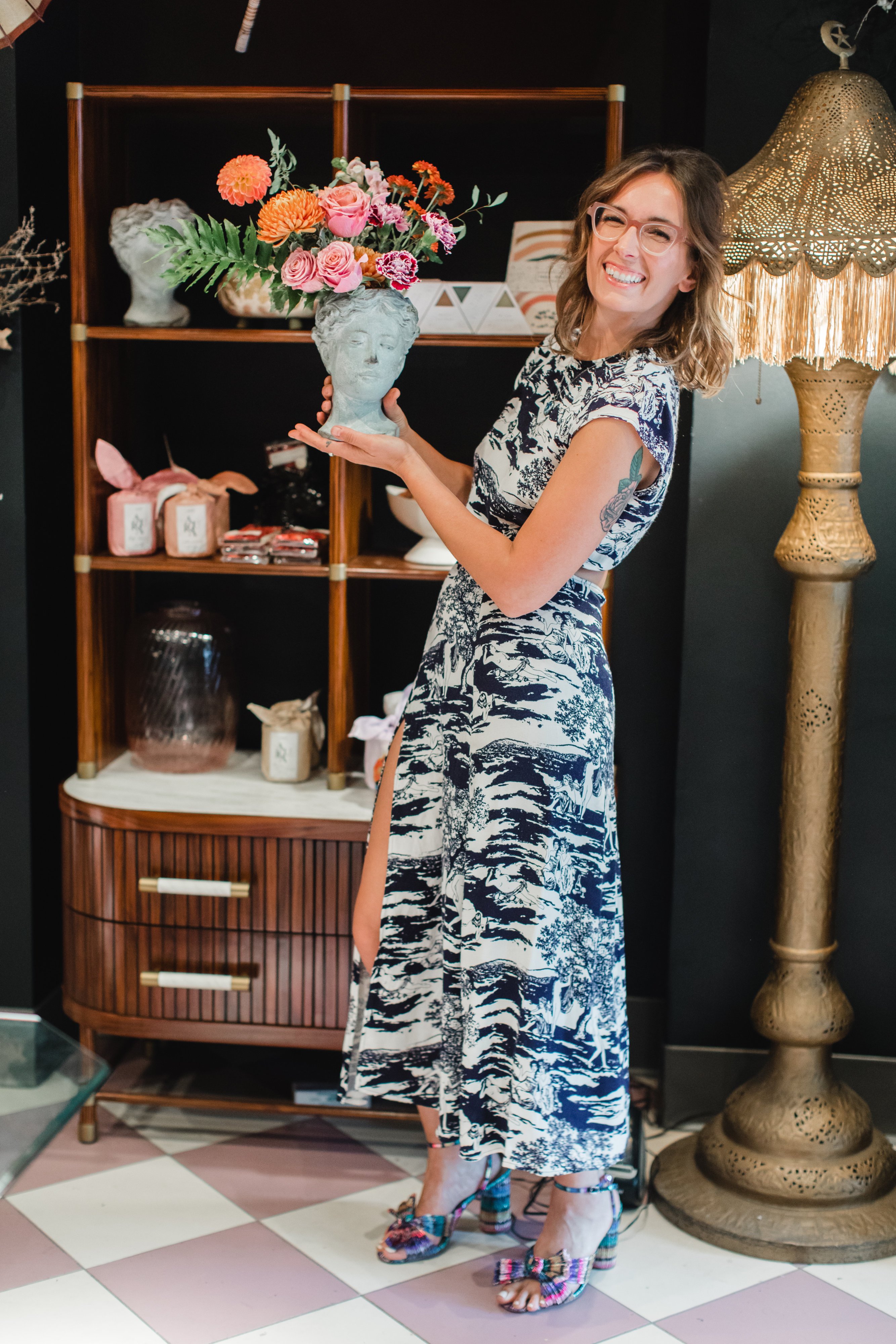 She Loves Me - Washingtonian She Loves Me Owner Holley Simmons with the Aphrodite vessel. Photo by Maddie Kaye Photo.