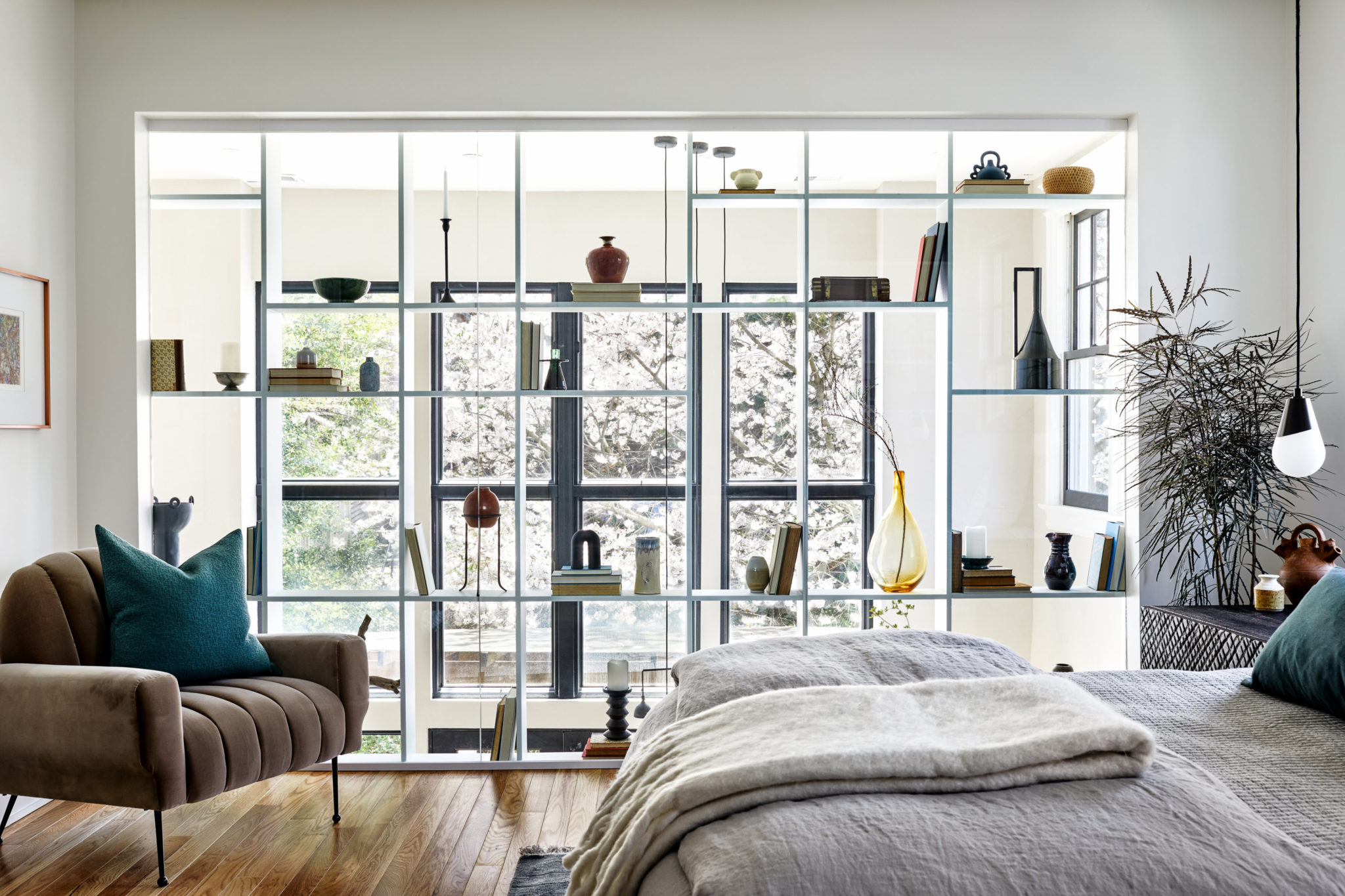 This DC Rowhouse Renovation Includes Dramatic Built-In Shelving and a Blue Kitchen