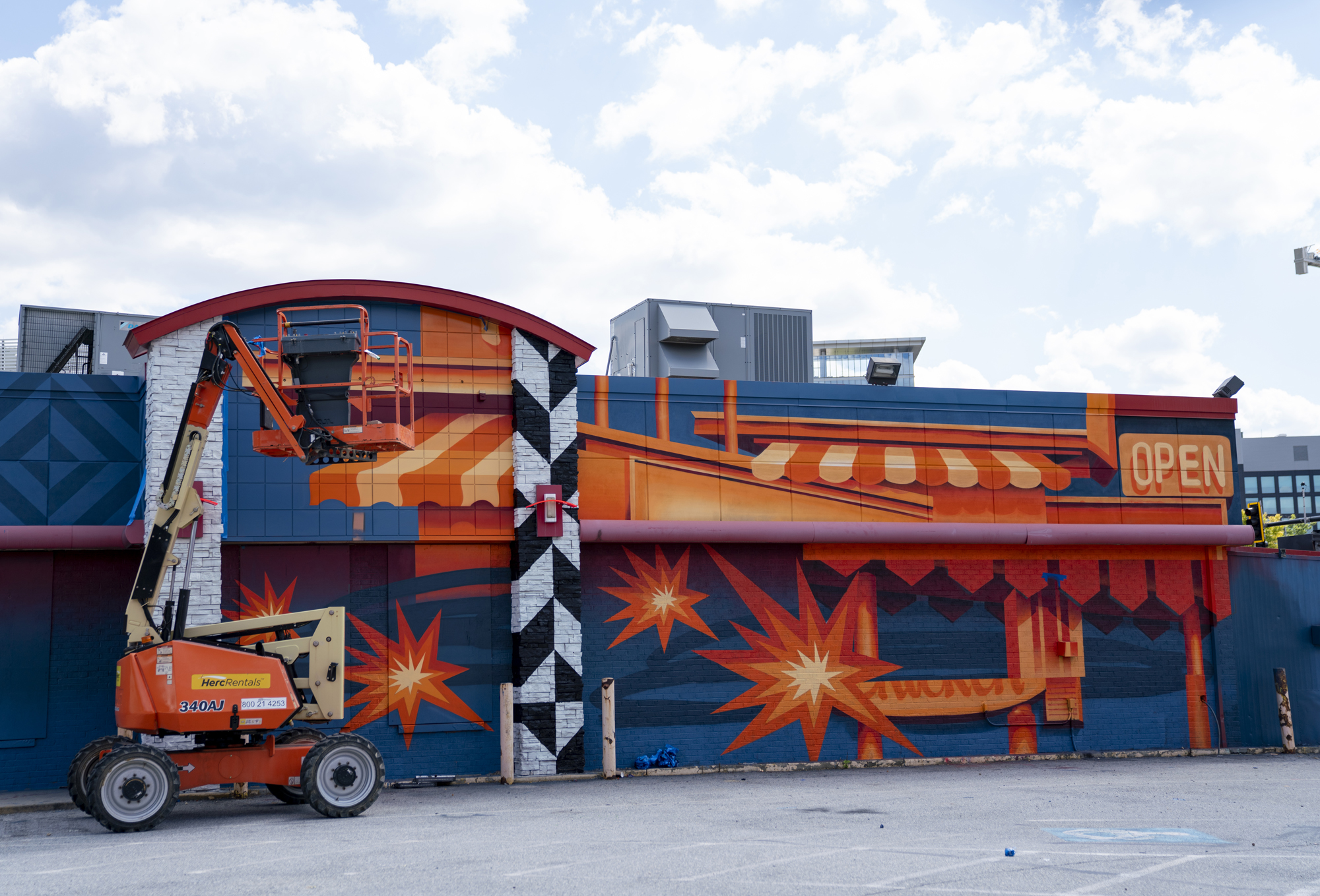 PHOTOS: The Wendy’s at Dave Thomas Circle Gets a Mural Makeover