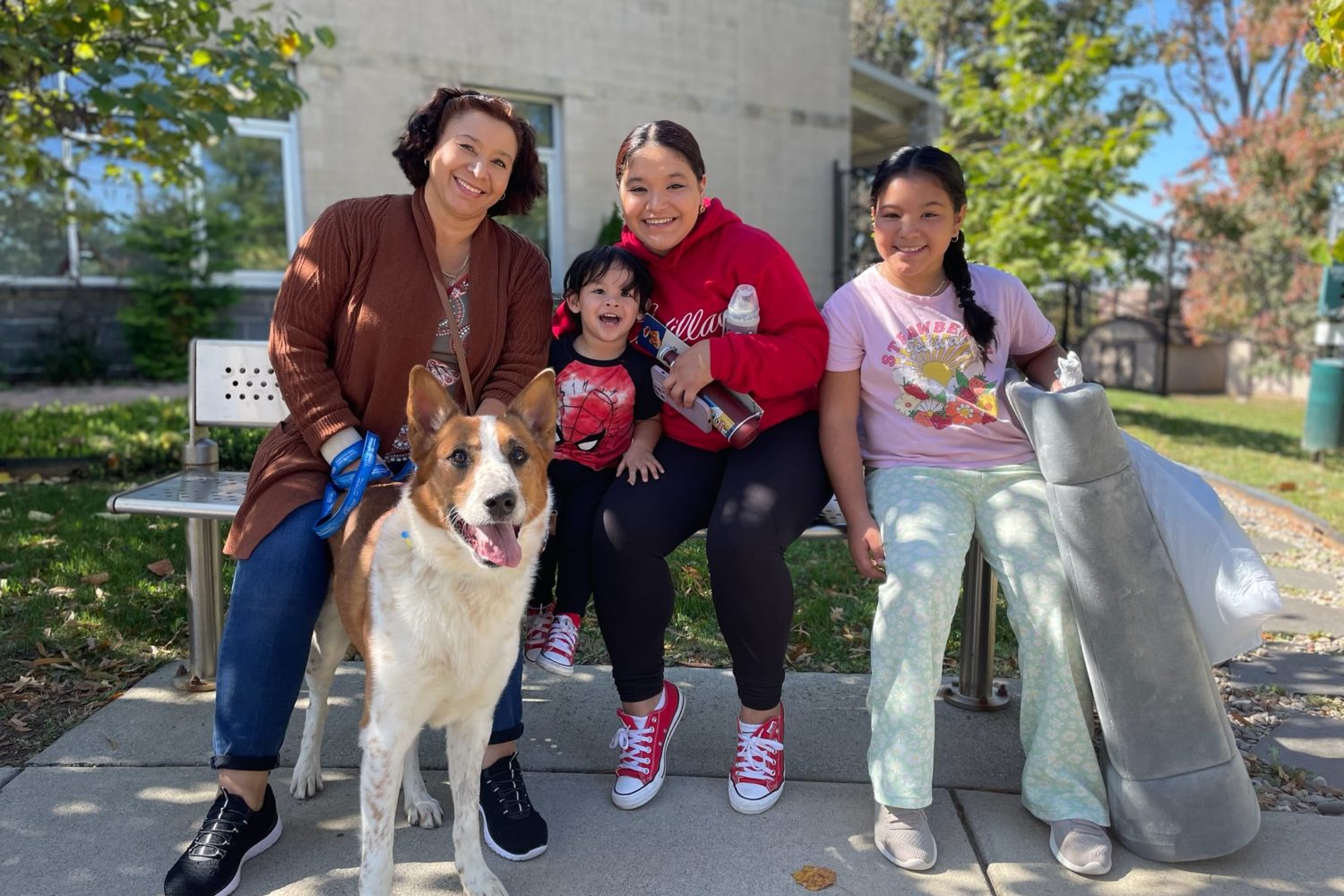 The Martinez family with their dog Dante