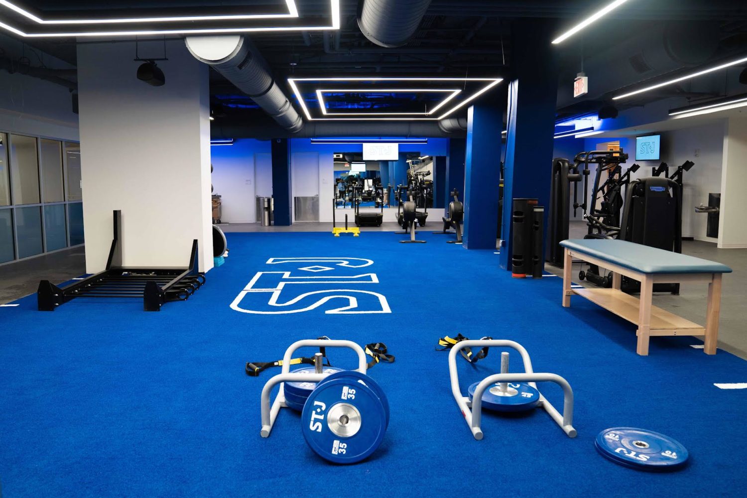 The 50,000-square-foot facility features gym equipment, a lap pool, and turf fields. Photo courtesy of the St. James.
