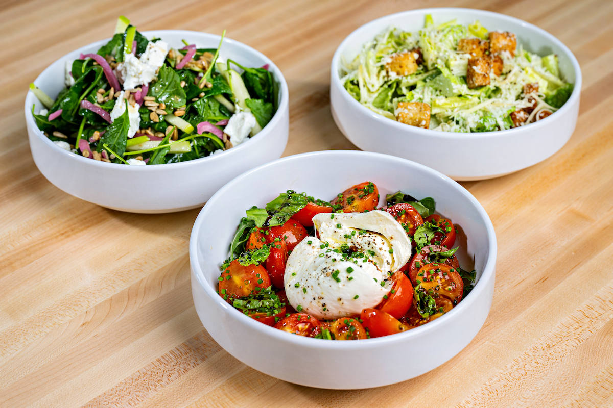 Creamy burratacCaprese with basil and balsamic, and other shareable salads. Photograph by Daniel Swartz