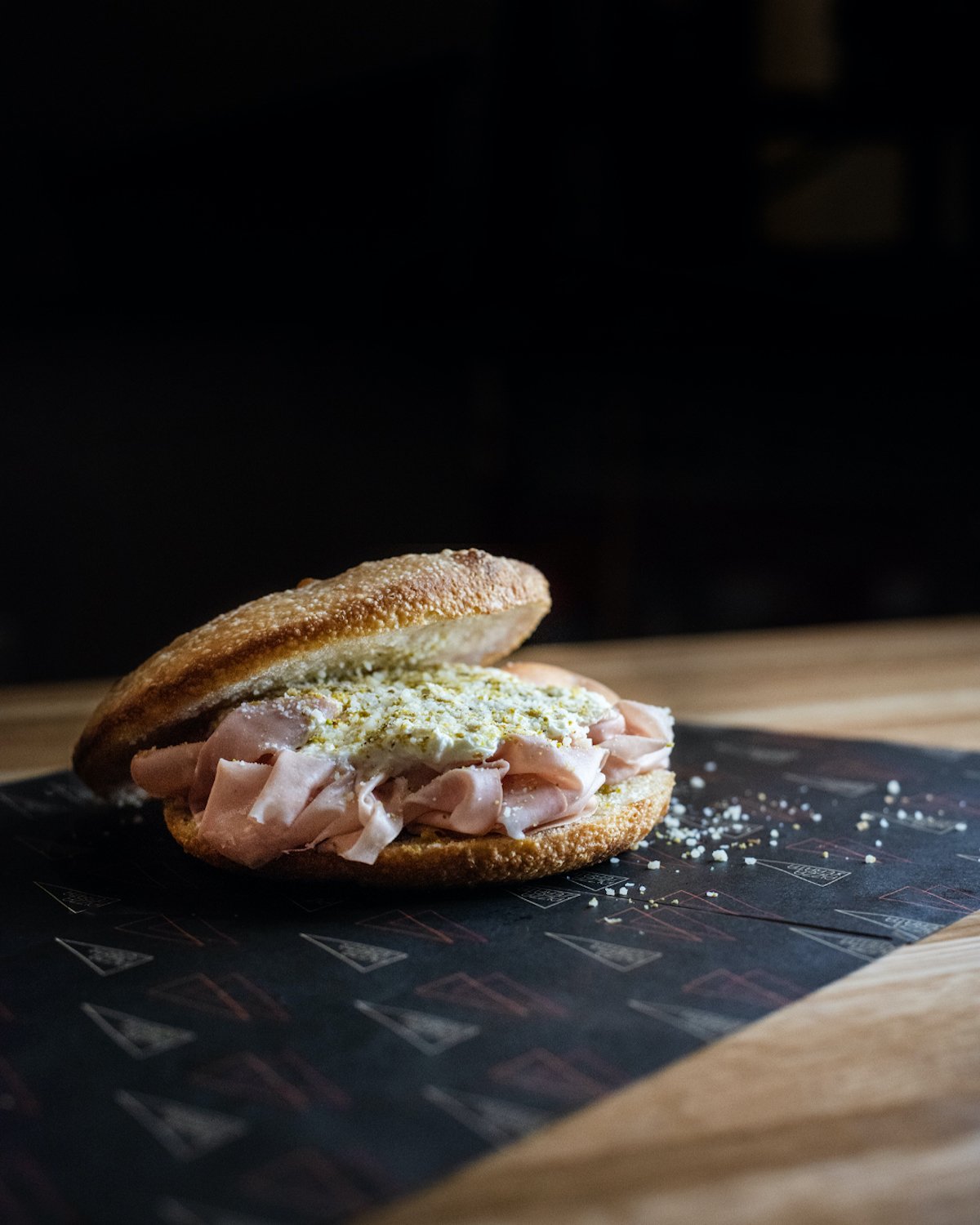 A mortadella and pistachio pesto sandwich with straciatella cheese. Photograph by Josh McDonough