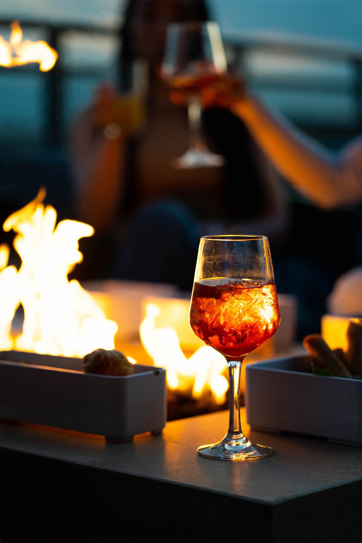 Upstairs_Firepit - Washingtonian Sip cocktails by fire pits at Upstairs at the Morrow. Photograph courtesy of the Morrow.