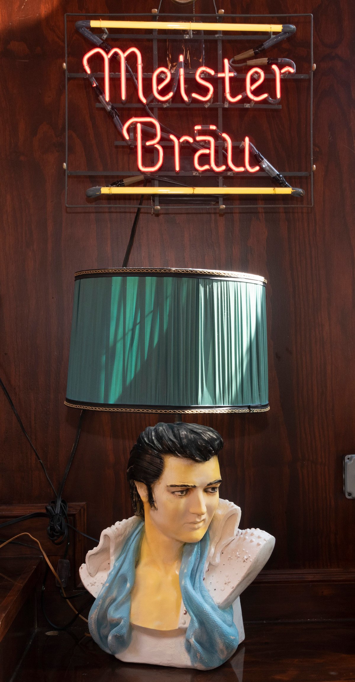 Whitlow's Americana decor has bar-hopped over the decades, like the Elvis lamp. Photograph courtesy of Whitlow's