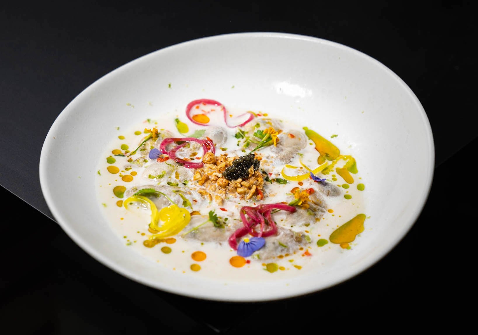 rominandyusa-1 (4) - Washingtonian Vera's oyster ceviche with labneh leche de tigre, pickled turmeric onions, red pepper fresno, and caviar