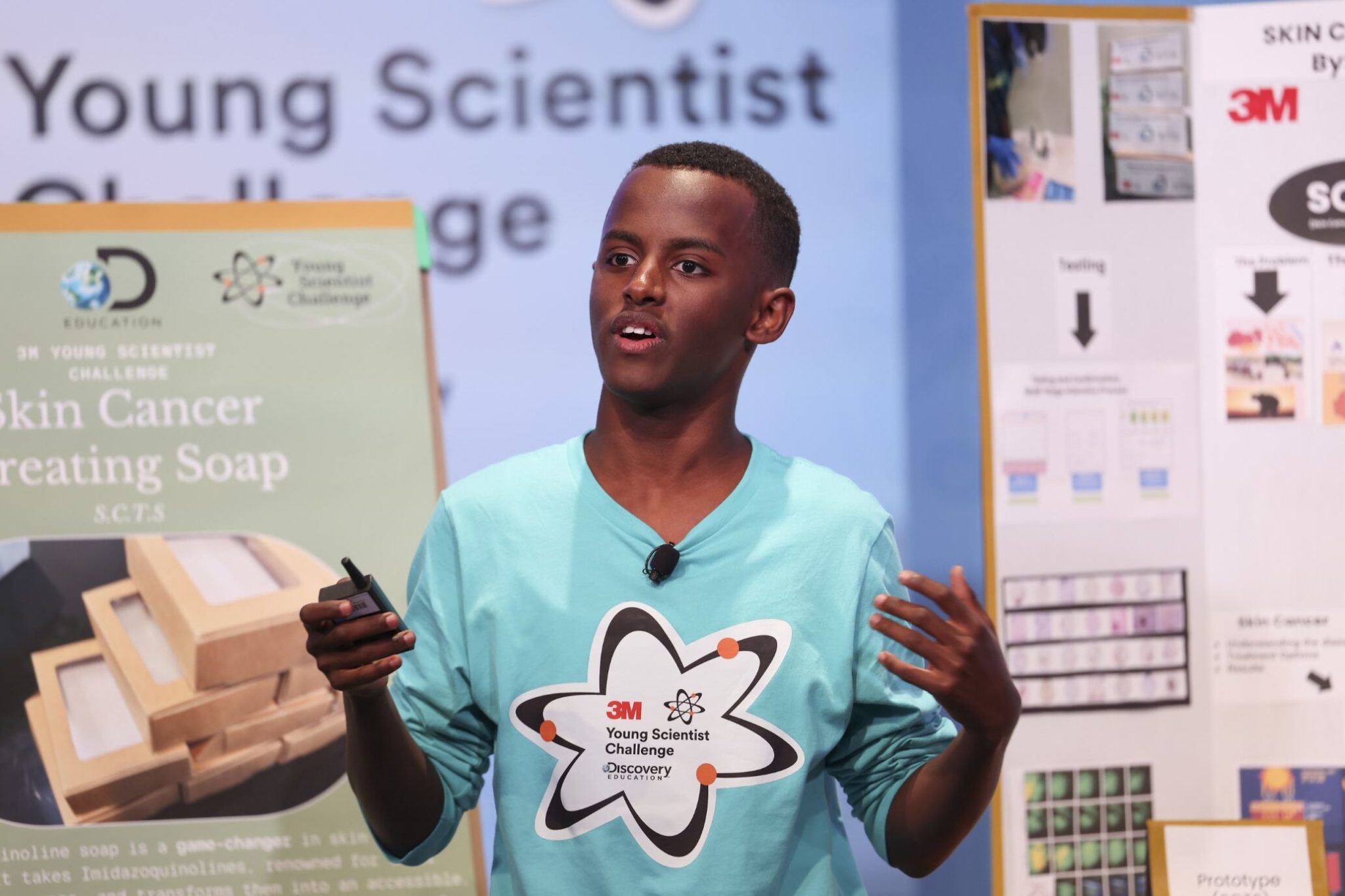 Heman Bekele presents his research idea for a skin cancer fighting soap. Photograph courtesy of 3M and Discovery Education.