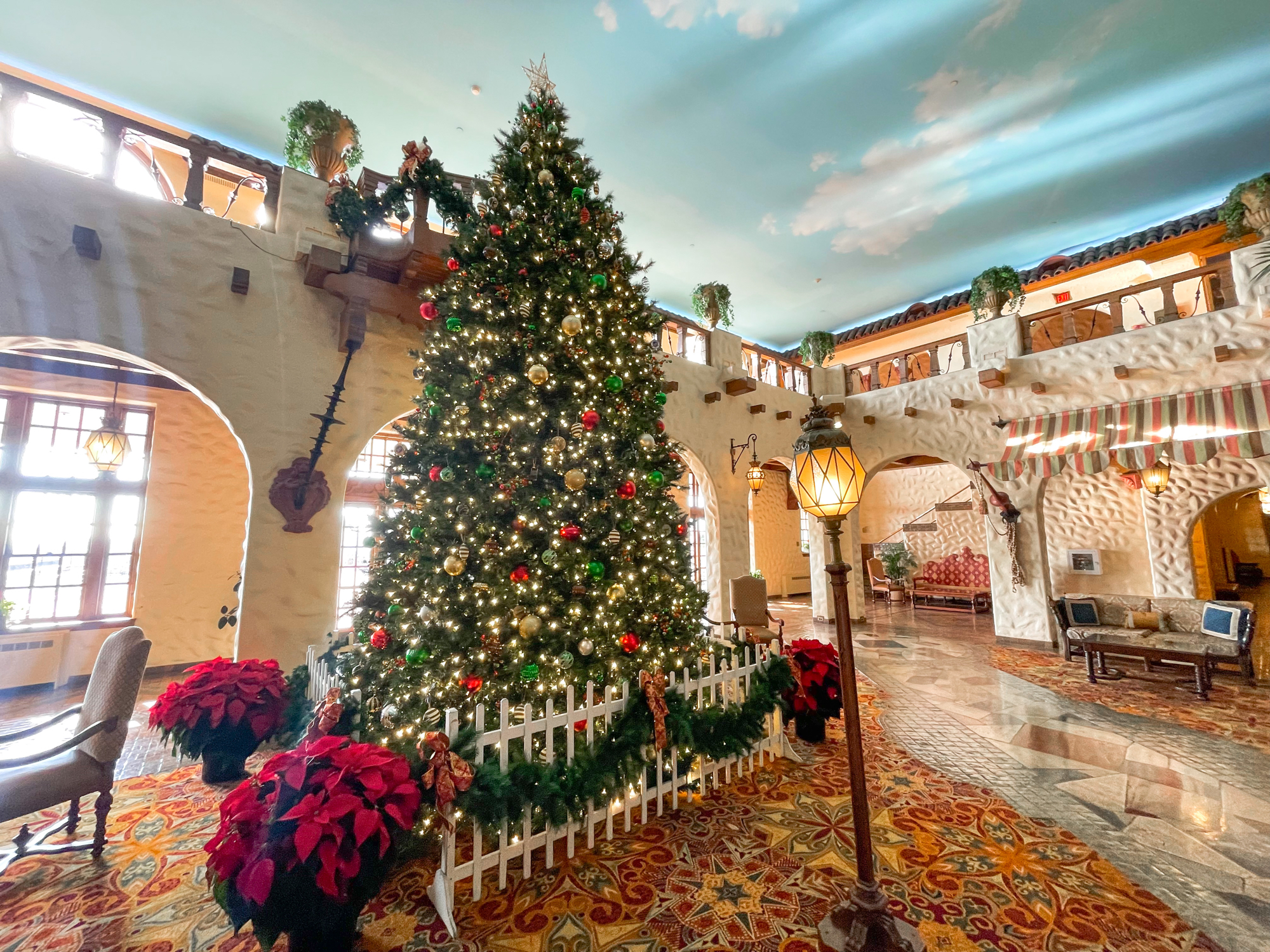 PHOTOS: 96-foot-tall Christmas tree goes up in flames outside hotel