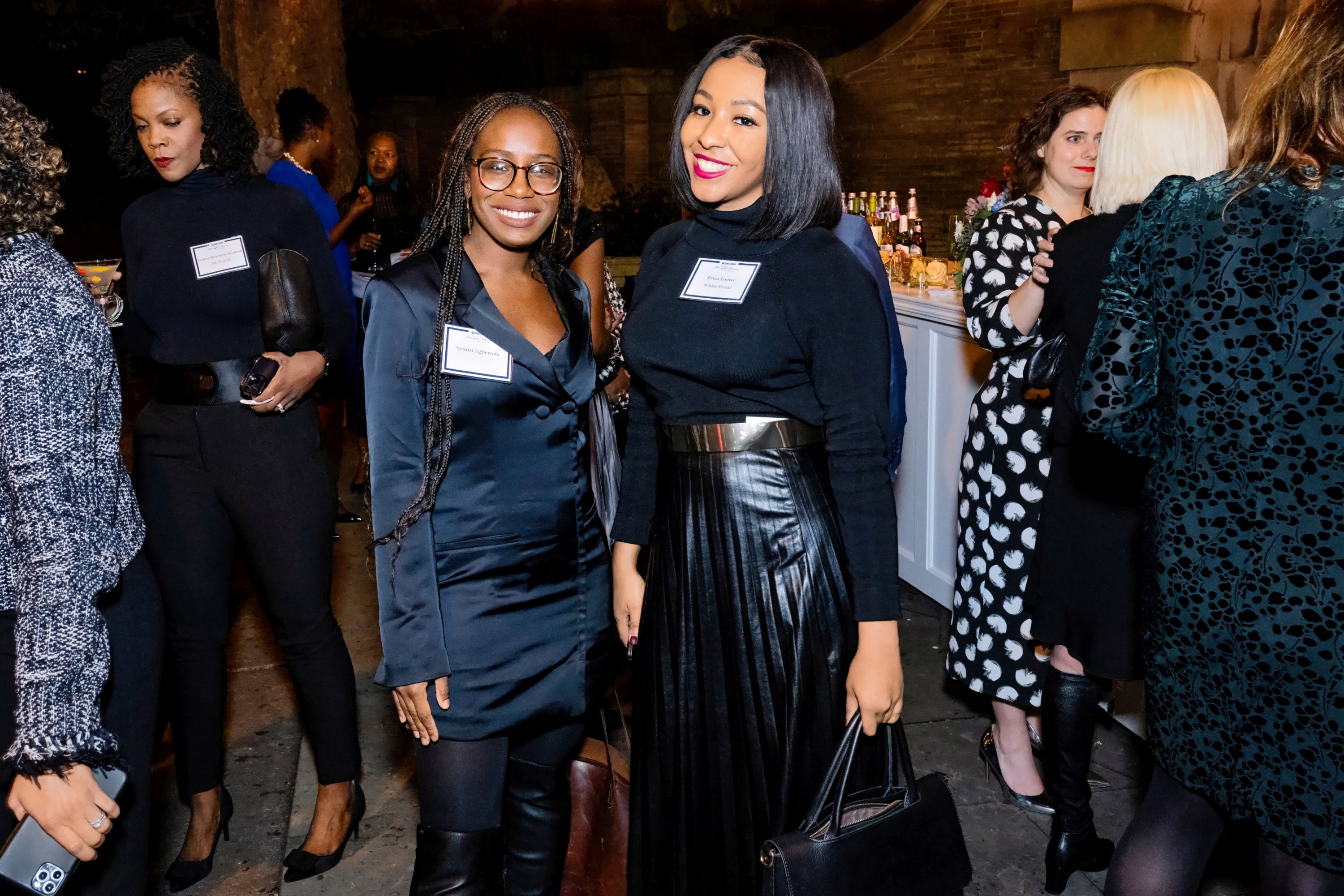  2 women smiling at the camera