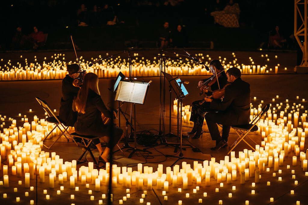 Candlelight Concerts feature a string quartet performing holiday music. Photo courtesy of Fever. 