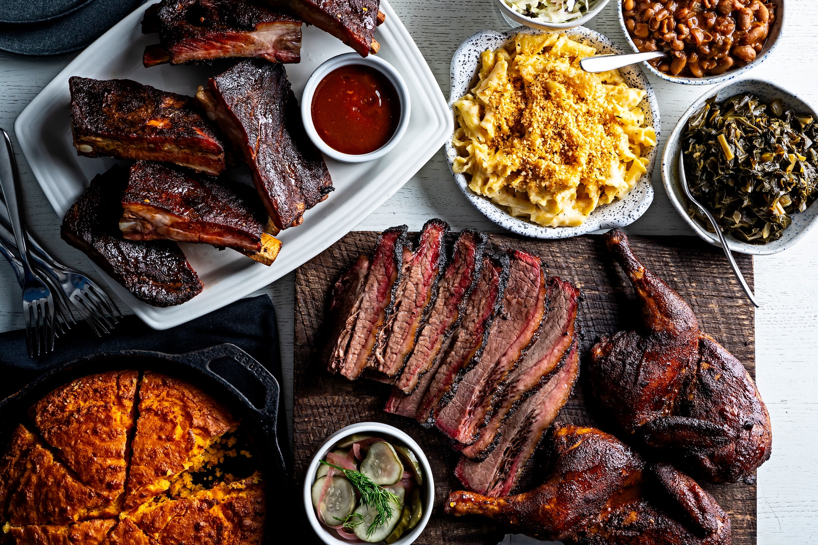 A platter of cornbread, brisket, Mac and cheese and other Super Bowl foods.