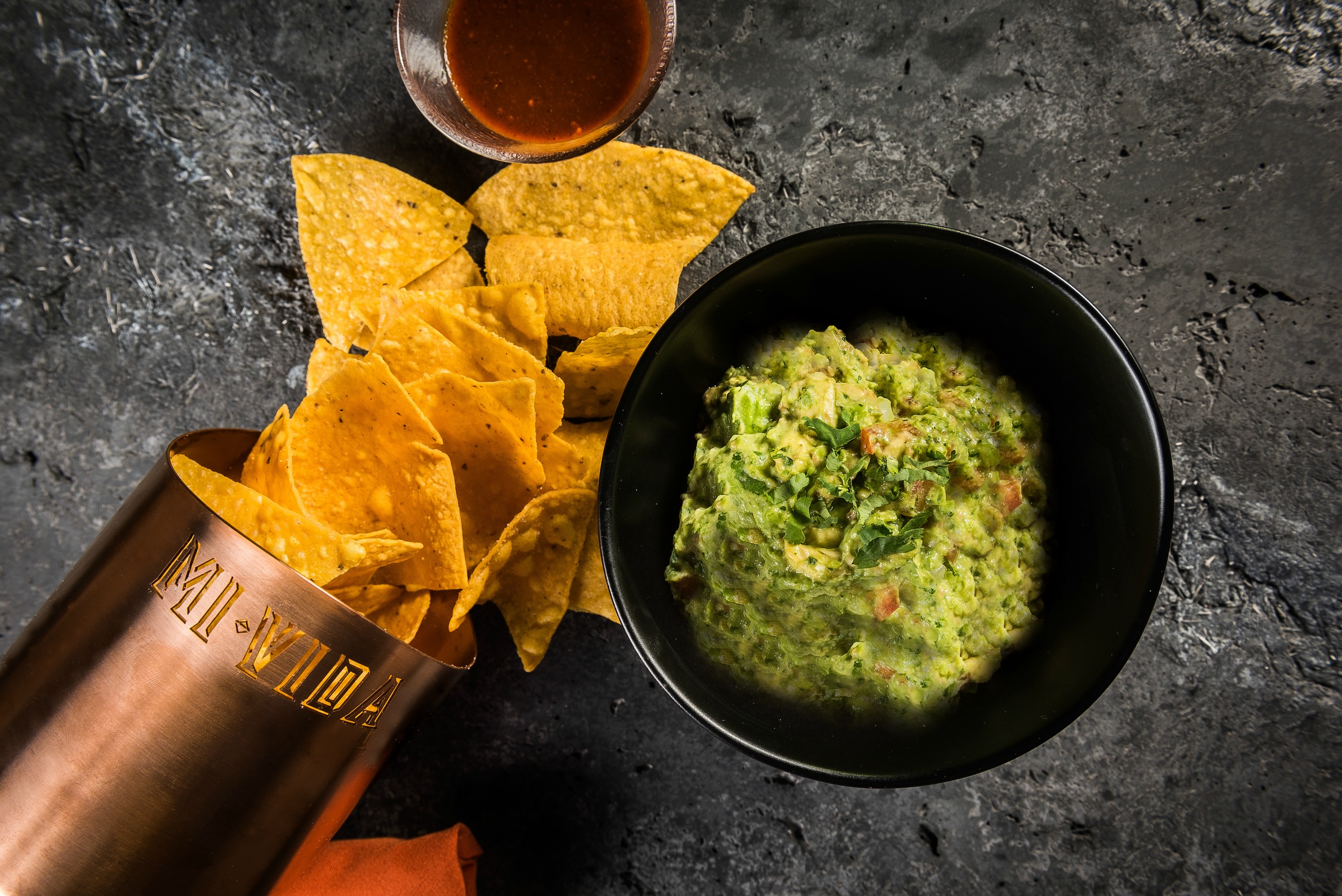 Guacamole with crab and tortilla chips.