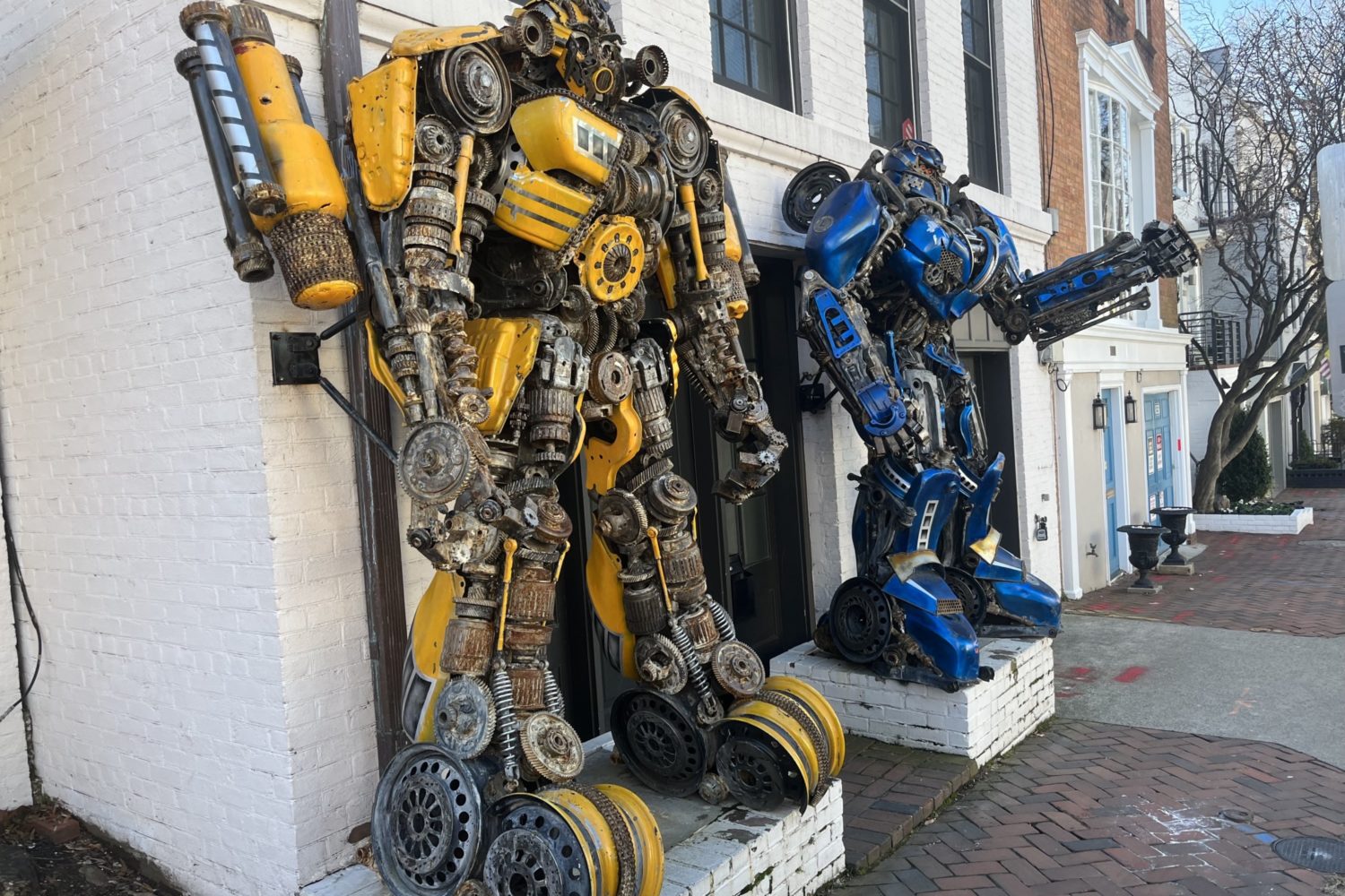 Optimus Prime and Bumblebee flank Dr. Newton Howard's front door in Georgetown.