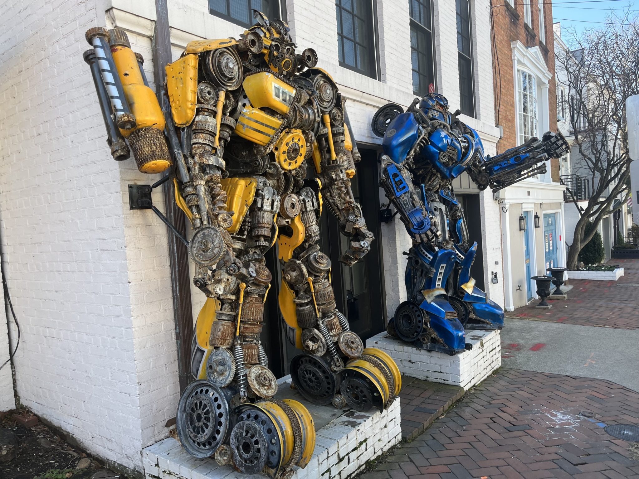 Optimus Prime and Bumblebee flank Dr. Newton Howard's front door in Georgetown.