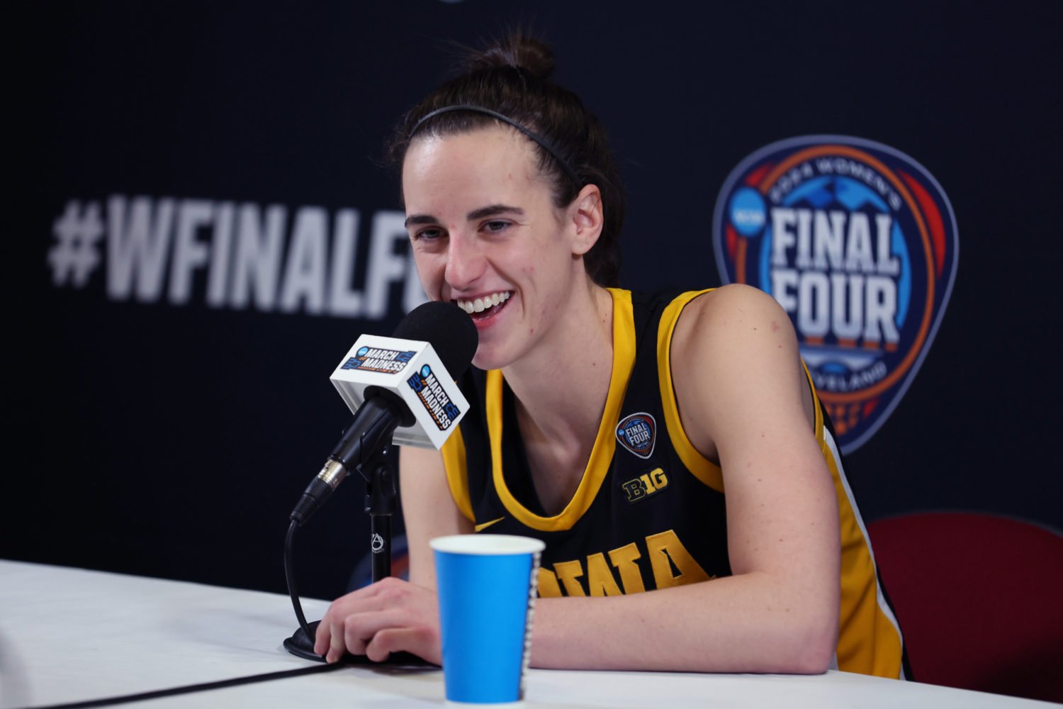 Caitlin Clark at a press conference during the 2024 NCAA Women's Basketball Tournament National Championship. Photograph by Steph Chambers/Getty Images