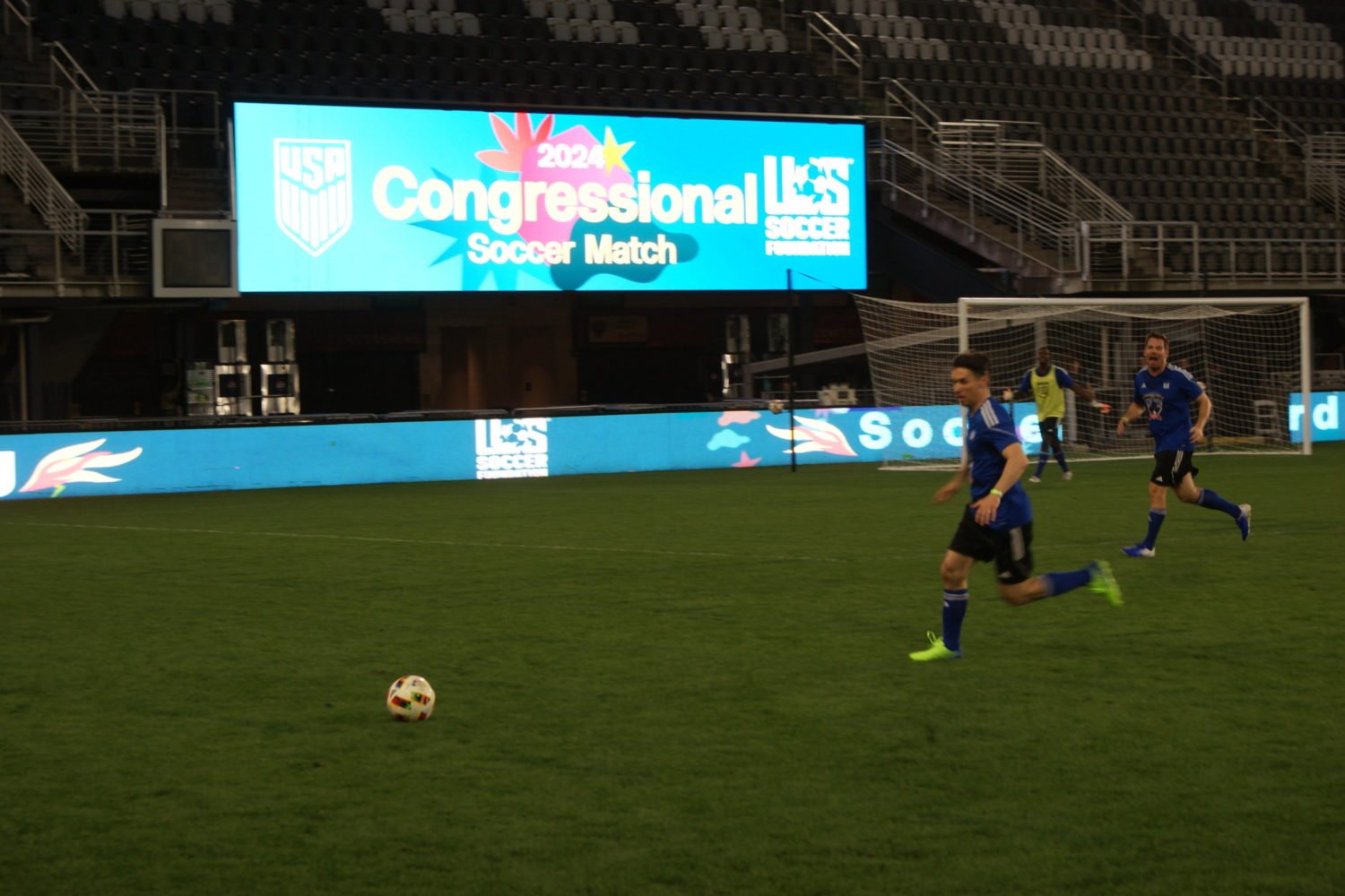 Rep. Morgan McGarvey (D-KY) chases the ball at the Congressional Soccer Game.